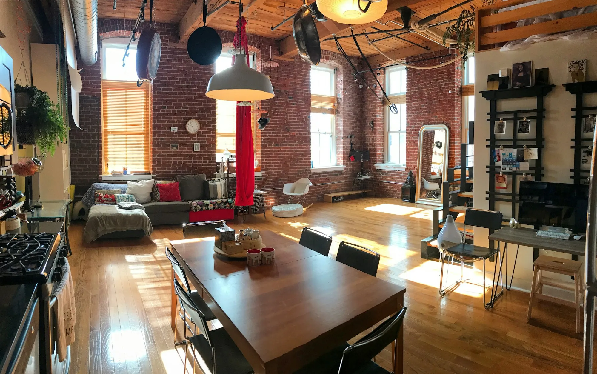 Wooden dining table and chairs in a loft