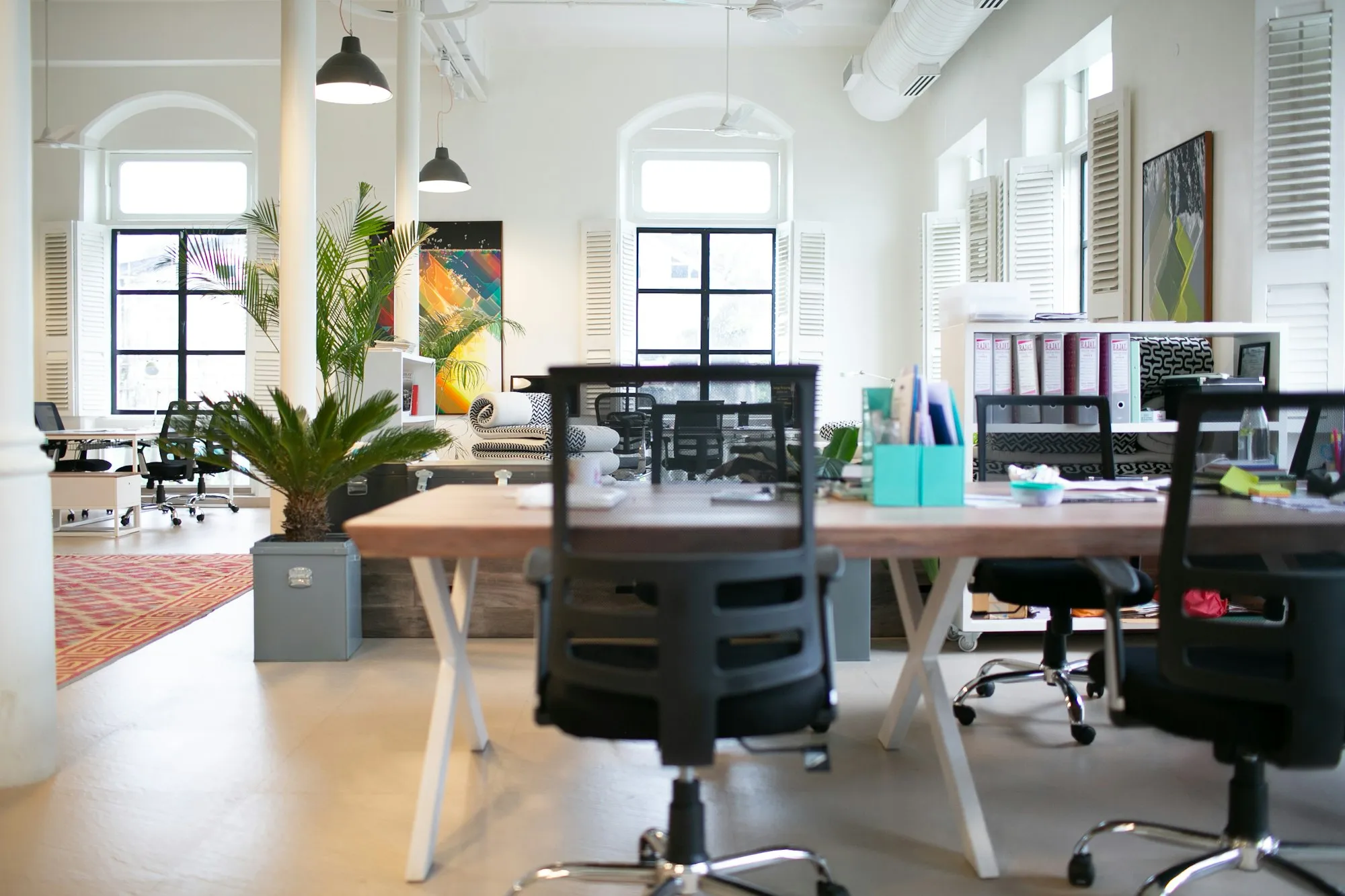 Quiet office corner with chairs around a table
