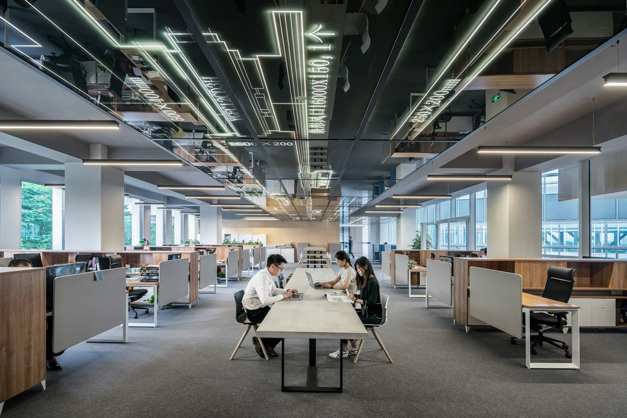 Open office with a long shared work table