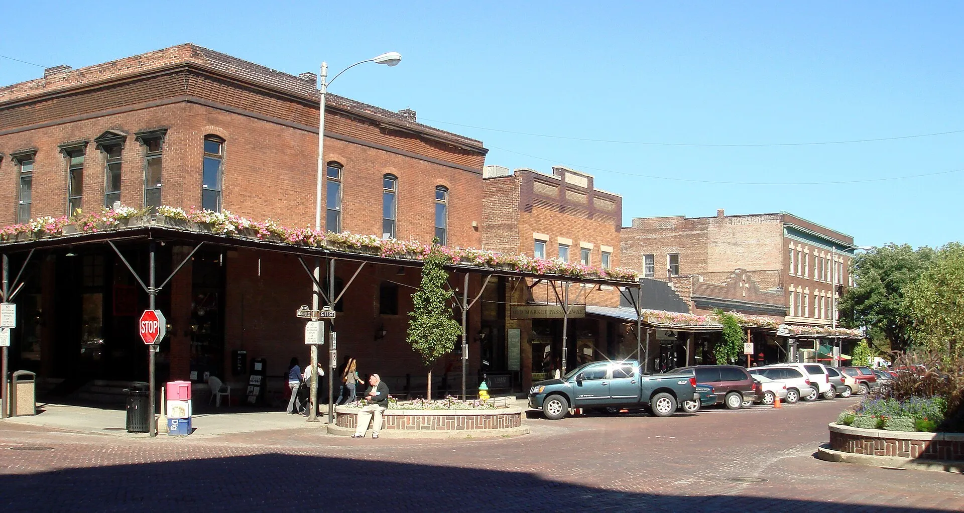 Brick warehouses and shops along a street in Omaha’s Old Market